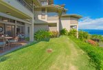 There is a large grass area adjacent to the lanai, which provides extra space for you and your guests